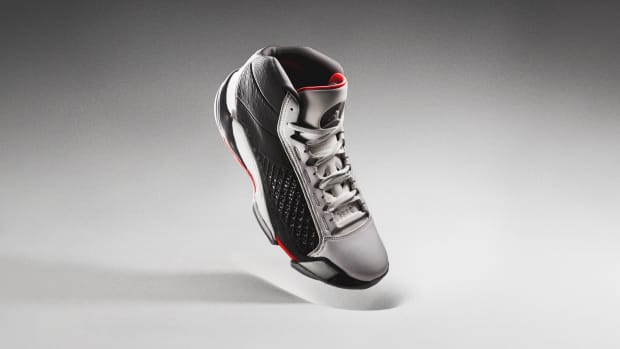 Side view of the black and white Air Jordan 38 basketball shoe.